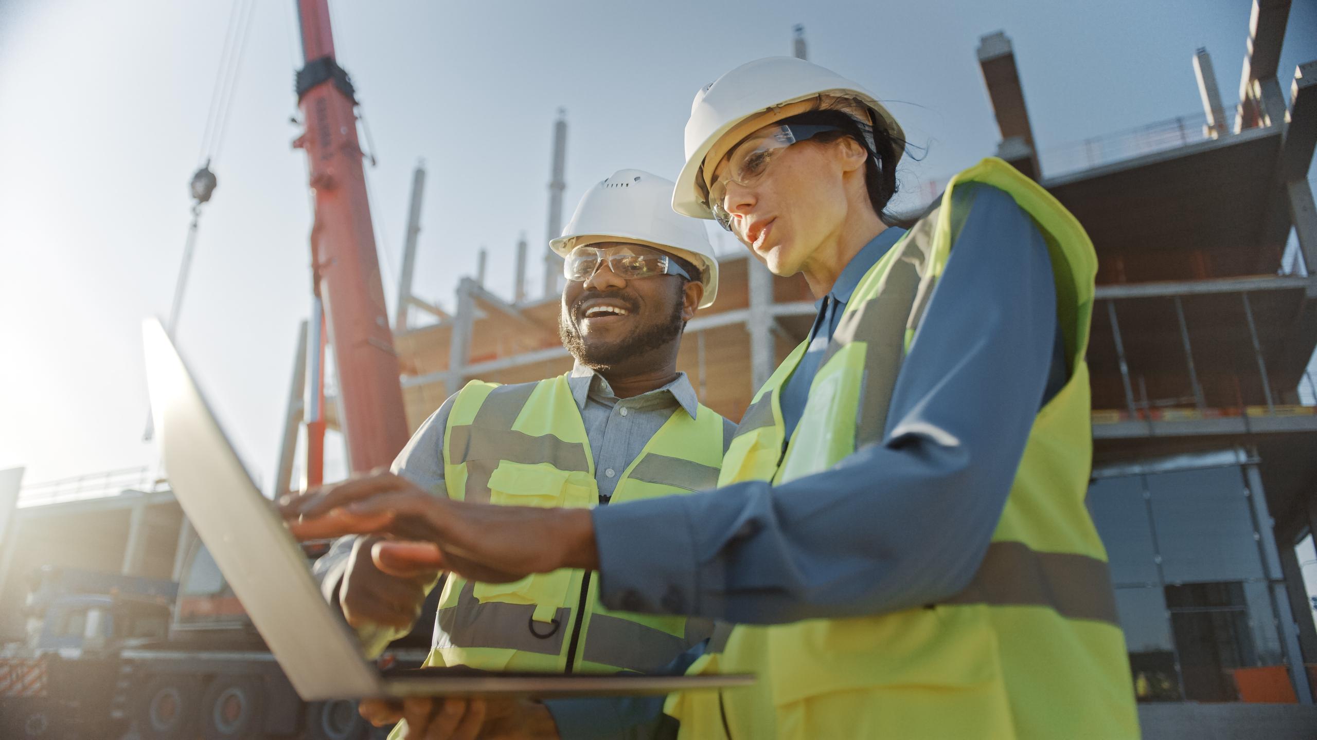 Two Specialists Inspect Commercial, Industrial Building Construc