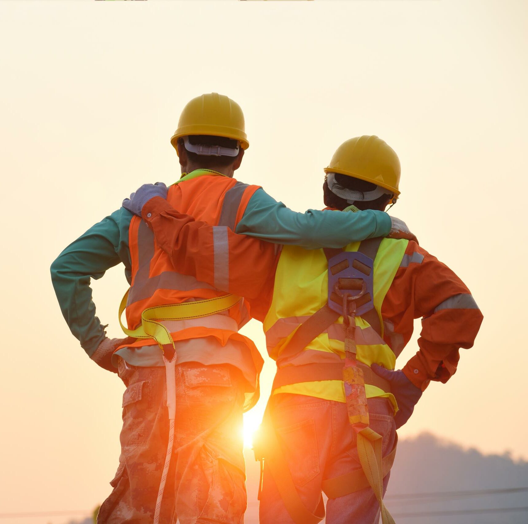 Engineers In Yellow Helmet And The Best Greetings With The Warm