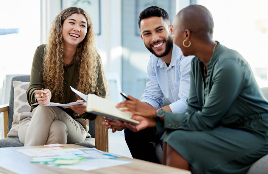 Foresight difference Happy business people smile during a planning meeting in an office.